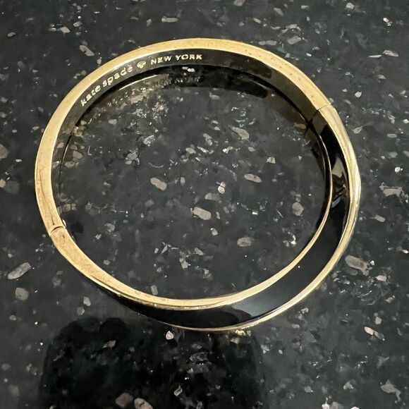 Kate Spade New York Black Enamel and Gold Tone Wave Twist Bangle Bracelet - Picture 2 of 11